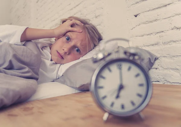 Sweet Sleepless Little Girl Lying Sad Bed Looking Alarm Clock — Stock Photo, Image