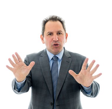 Orta yaşlı iş stratejisti hoparlör fikirleri tartışmak toplantı önde gelen stüdyo çekim.