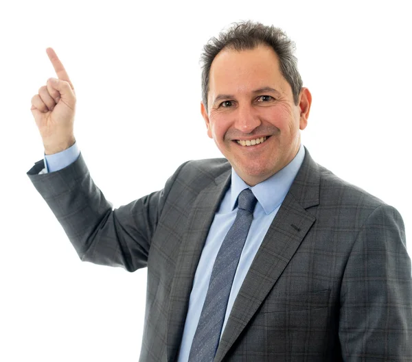 Retrato de um empresário confiante de meia-idade apontando para o espaço de cópia. Isolado em branco . — Fotografia de Stock