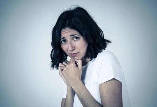 Portrait of a young attractive woman looking scared and shocked.Human expressions and emotions — Stock Photo, Image