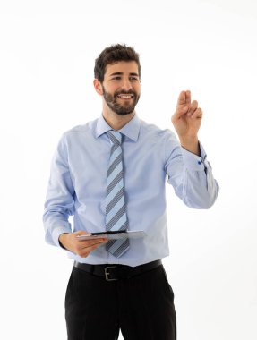 Genç çekici işadamı sanal bir ekran kullanarak olarak kopyalama alanı işaret. Güler yüzlü, kendinden emin ve başarılı bir duygu. İş hayatında iş eğitimi, başarı ve yeni teknoloji.