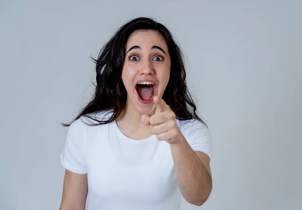 Excited latin teenager girl surprised and shocked feeling amazed by Unbelievable sales, Great news or Success. Woman screaming with overjoy, Euphoric winner. People expressions and positive emotions.