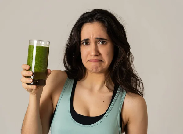 Attractive Dieting Girl Holding Healthy Green Juice Showing Dislike Gestures — Stock Photo, Image