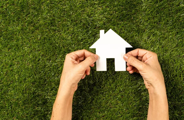 Conceptual Picture Woman Hands Holding White House Green Grass Field — Stock Photo, Image