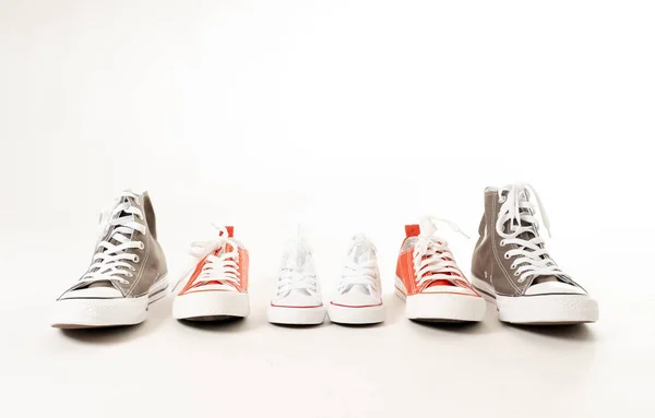 Conceptual Image Gumshoes Sneakers Father Mother Son Daughter Isolated White — Stock Photo, Image