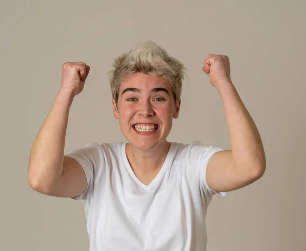 Portrait of young happy and excited transgender teen happy and excited winning, celebrating goal or having great success with proud face. In People Diversity and positive Human Emotions.