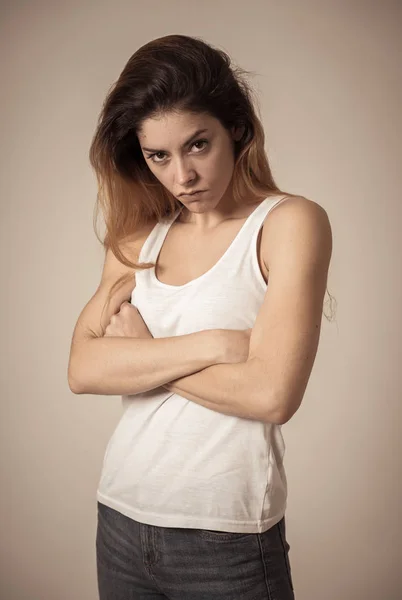Facial expressions, emotions Anger. Young attractive caucasian woman with angry face. Looking mad and aggressive making furious gestures. Studio portrait in People adolescent mental health concept.