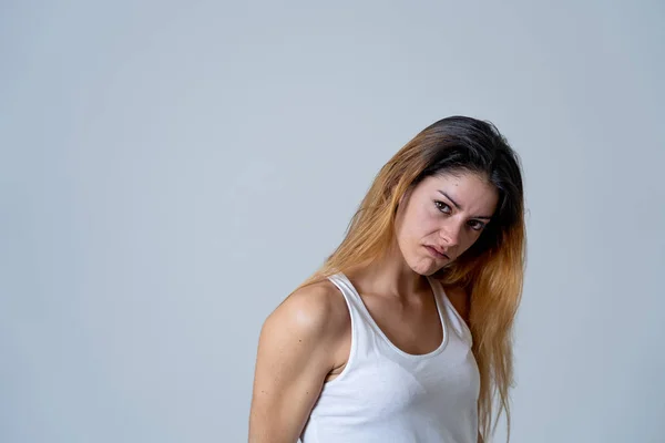 Facial expressions, emotions Anger. Young attractive caucasian woman with angry face. Looking mad and aggressive making furious gestures. Studio portrait in People adolescent mental health concept.