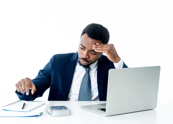 Angry and desperate african american entrepreneur businessman shouting at computer feeling tired and overworked at desk in People, Stress, Technology and Overtime concept isolated in white background.