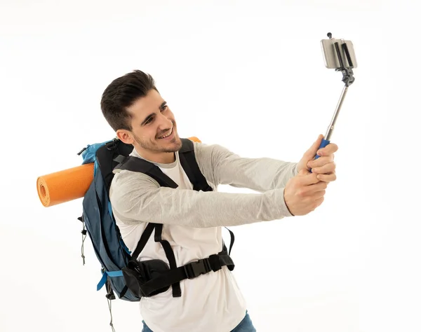 Portrait Young Backpacker Taking Selfie His Mobile Phone Isolated White — Stock Photo, Image