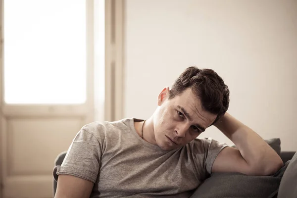 Portrait Young Man Felling Depressed Desperate Crying Alone Sofa Home — Stock Photo, Image