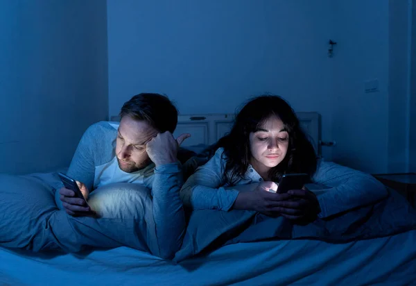 Life Style Portrait Young Bored Couple Bed Night Smart Phones — Stock Photo, Image