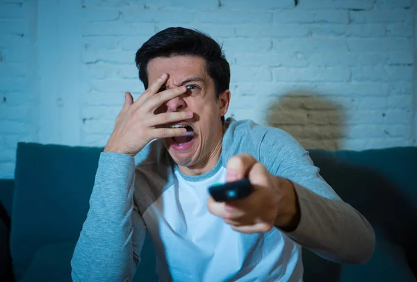 Lifestyle Portrait Young Scared Man Watching Horror Movie Unpleasant Violence — Stock Photo, Image