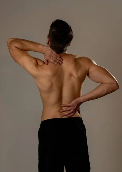 Young Muscular Fitness Man Touching Grabbing His Neck Lower Back — Stock Photo, Image