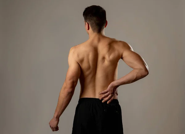 Young Muscular Fitness Man Touching Grabbing His Lower Back Suffering — Stock Photo, Image