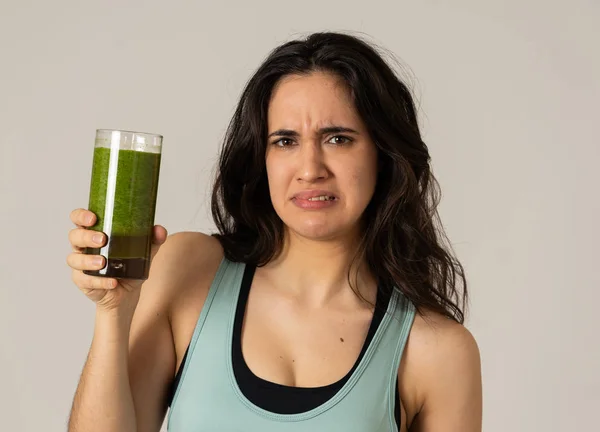 Attractive Dieting Girl Holding Healthy Green Juice Showing Dislike Gestures — Stock Photo, Image