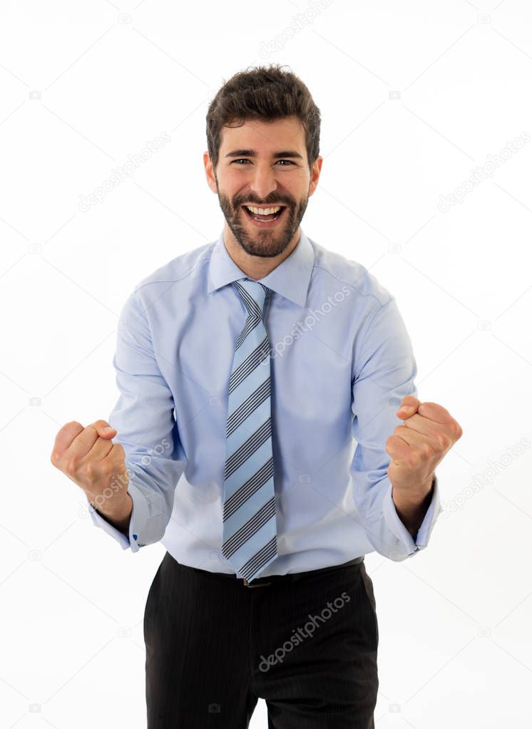 Portrait of hipster businessman celebrating success with fist up feeling happy. Isolated on neutral background with copy space. In people business, career education and successful young men.