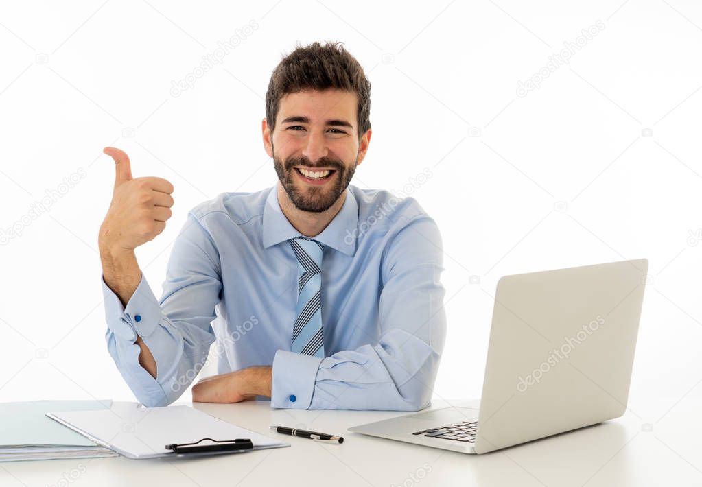 Smiling and confident young executive businessman with laptop working and surfing on the internet in successful employees, happy at work and technology concept isolated on white background.