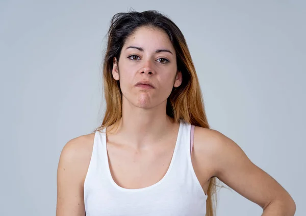 Facial expressions, emotions Anger. Young attractive caucasian woman with angry face. Looking mad and aggressive making furious gestures. Studio portrait in People adolescent mental health concept.