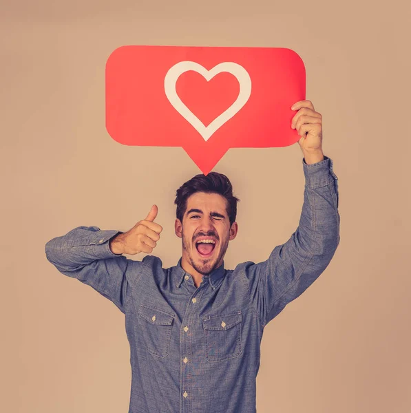 Hombre Atractivo Sosteniendo Símbolo Del Corazón Gusta Encanta Icono Notificación — Foto de Stock