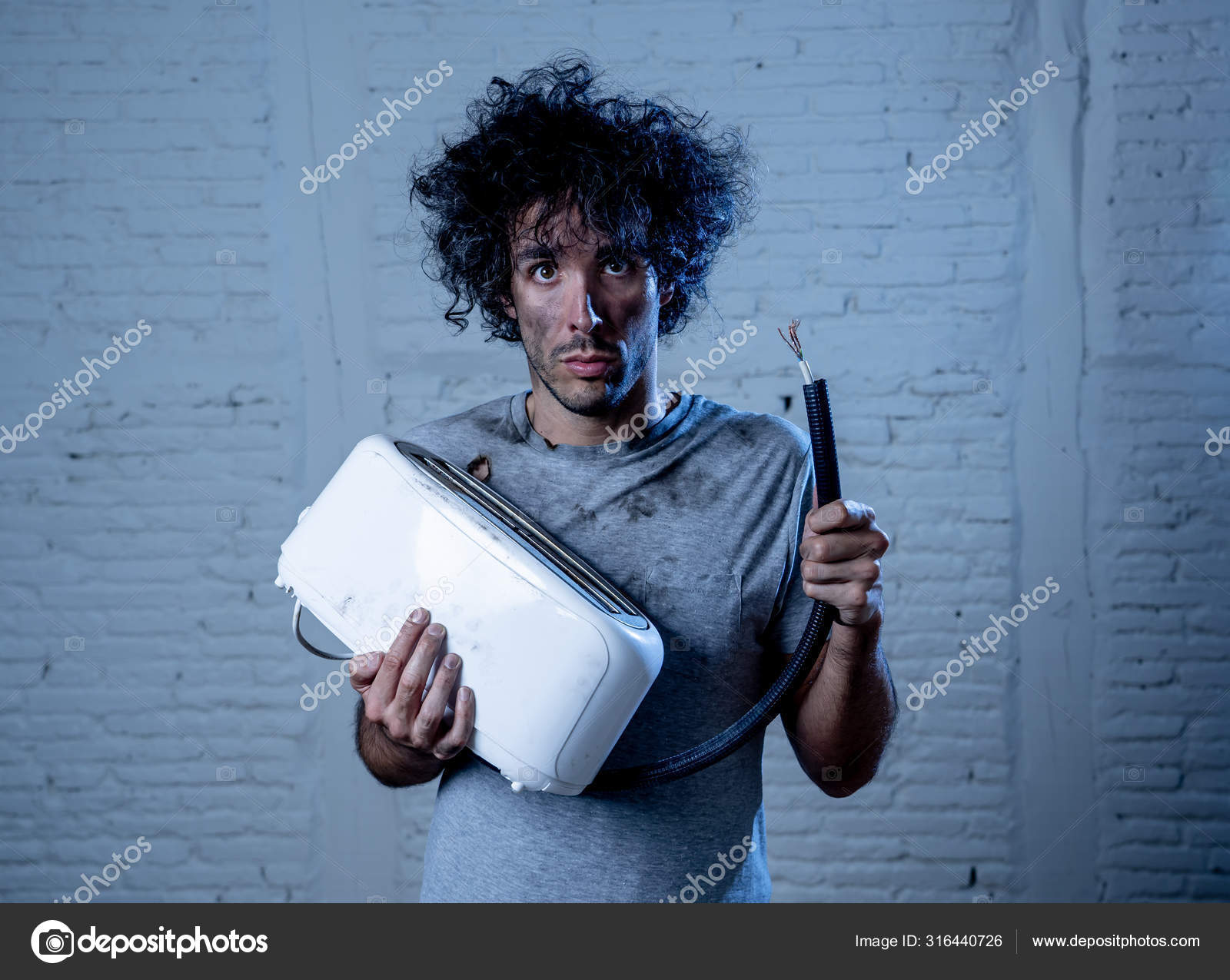 Domestic Accidents Electricity Dangers Young Man Electrocuted Trying Fix Toaster Stock Photo by