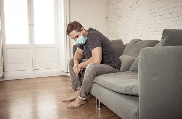 Sad Man Protective Face Mask Home Living Room Couch Feeling — Stock Photo, Image