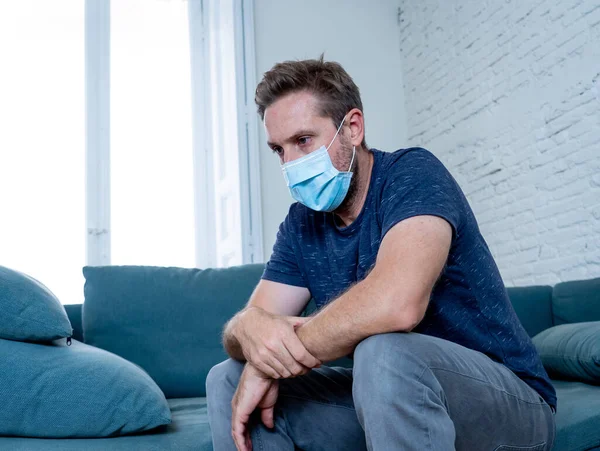 Sad Man Protective Face Mask Home Living Room Couch Feeling — Stock Photo, Image