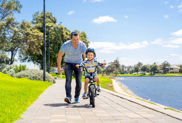 Boy Learning Ride Bicycle His Father Park Lake Father Son — Stock Photo, Image