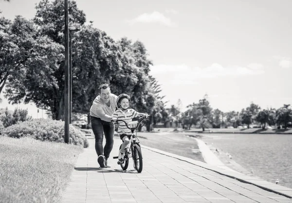 Boy Learning Ride Bicycle His Father Park Lake Father Son — Stock Photo, Image