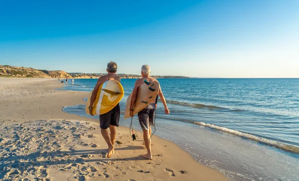 Two Mature Men Walking Surfboards Beautiful Beach Enjoying Paradise Retirement — Stock Photo, Image