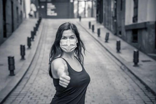 Young Woman Wearing Surgical Mask Face Showing Thumb Ups Happy — Stock Photo, Image