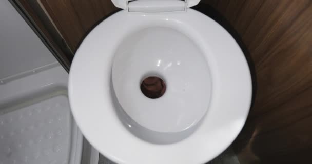 Toilet flushed top down view. — Stock Video