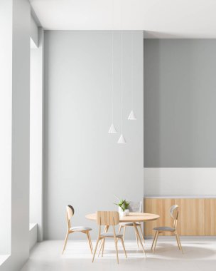 Yemek masası içeren geniş modern mutfak. Minimalist yemek salonu