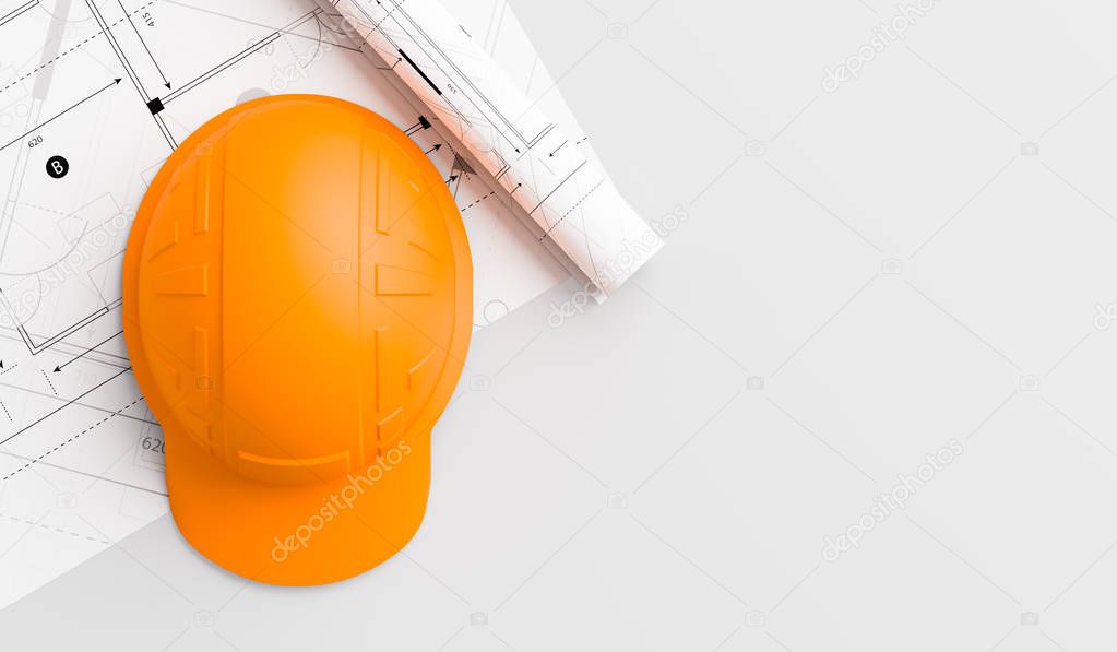 Orange or brown safety helmet on wooden table with blueprints. S