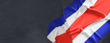 Kosta Rika bayrağı. Kumaş desenli Kosta Rika bayrağı koyu arka planda izole edilmiş. 3B illüstrasyon