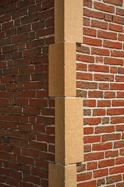 Brick wall forming the corner of building in Brussels