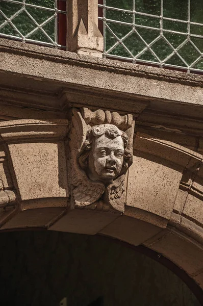 Decorative sculpture in human shape on building of Bruges — Stock Photo, Image