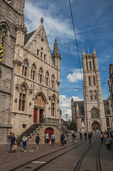 People and gothic buildings with cathedral in Ghent — Stock Photo, Image