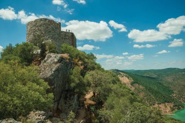 Castle on top of rocky cliff near the Tagus River valley clipart