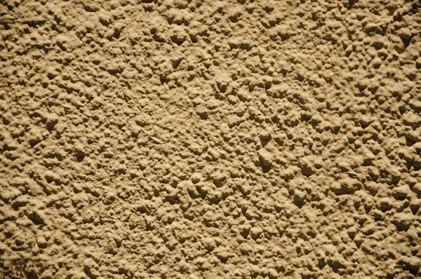 Mur avec petit gravier inséré dans le plâtre à Merida — Photo