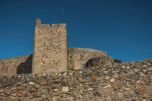 Stone wall and square tower at he Marvao Castle Stock Image