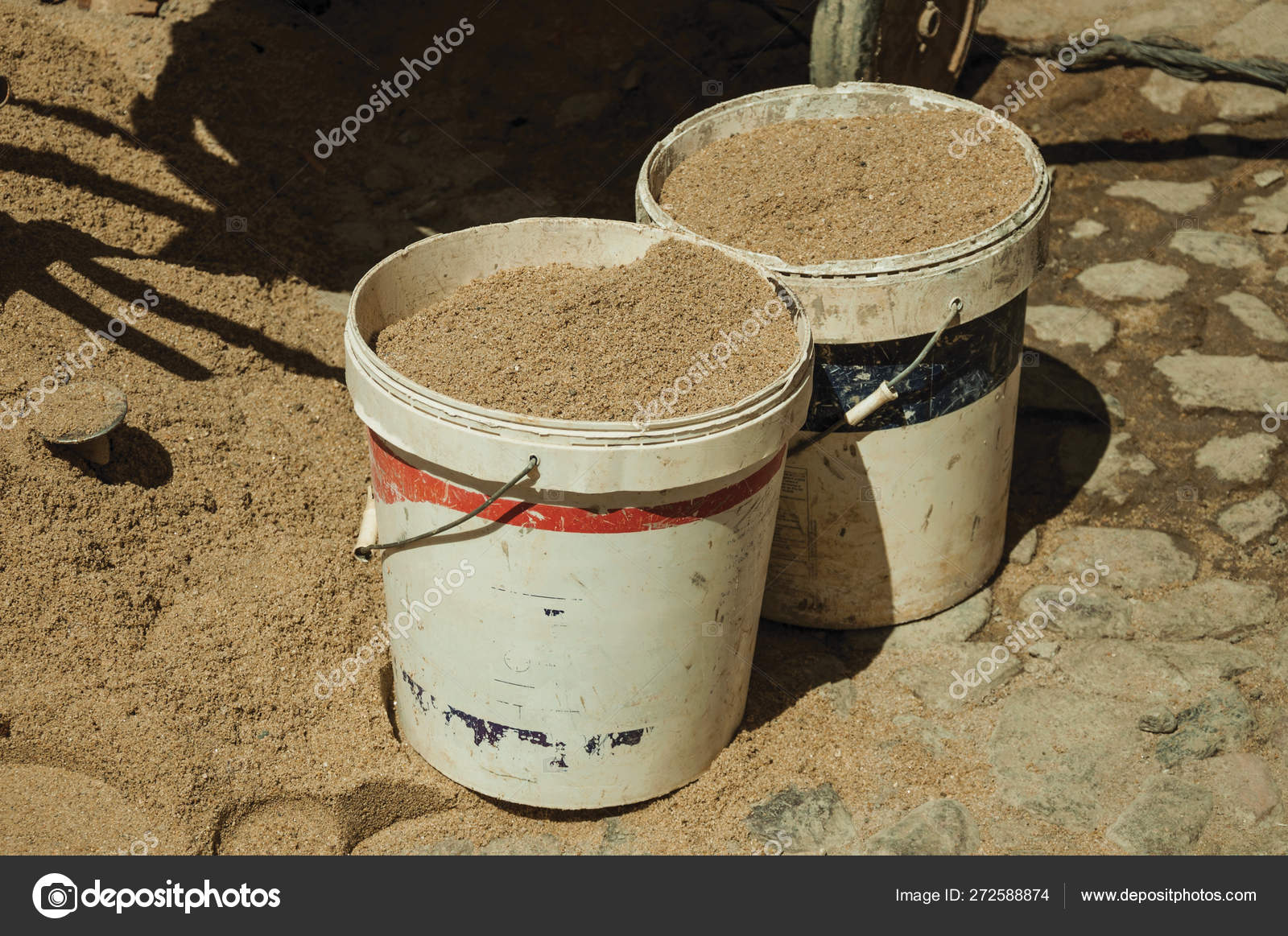 Plastic buckets with sand in construction site Stock Editorial Photo © Celli67 272588874
