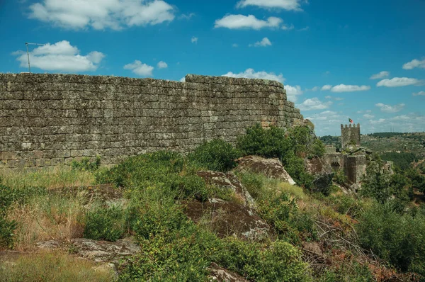 Outer stone wall on a rocky terrain