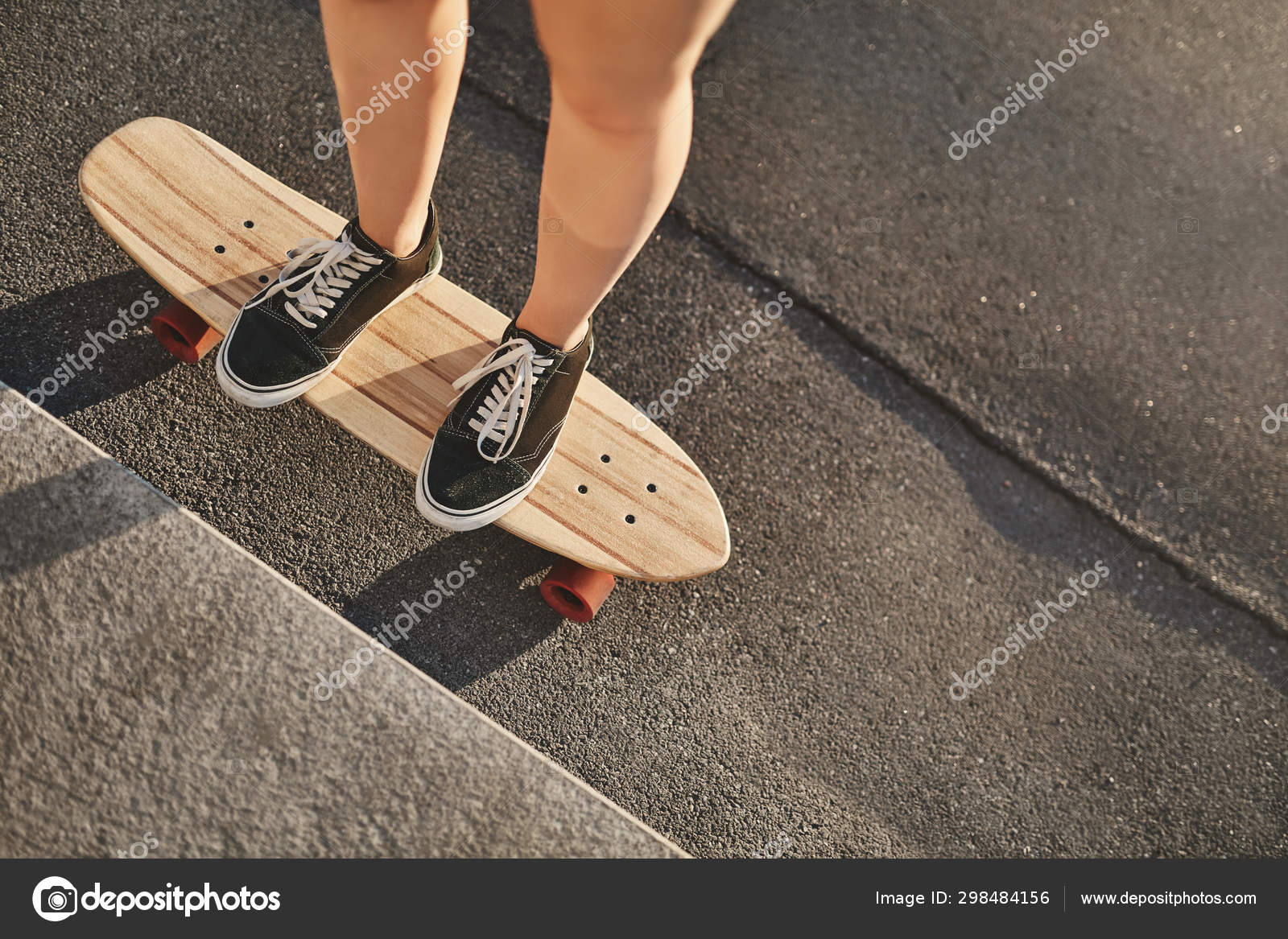 Upper Angle Cropped Shot Caucasian Woman Hands In Sneakers Standing On Wooden Penny Board Perform Kickflip Learn How Do Tricks And Stunts At Concerete Skatepark With Skateboard Sunbeams Shine Stock Photo By C Ringsaroundme
