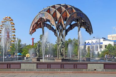 Fountain with ancient figures in the city Park of Tyumen clipart