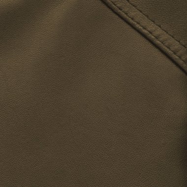 kahverengi deri arka plan bir dikiş ile dekore edilmiştir.