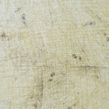 arka plan olarak beyaz eski çizilmiş plastik kesme tahtası parçası