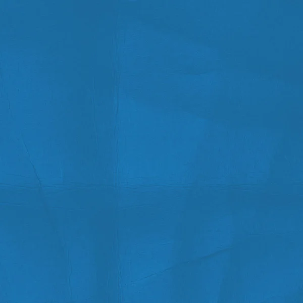 しわくちゃの紙のテクスチャに基づく青色の背景 — ストック写真