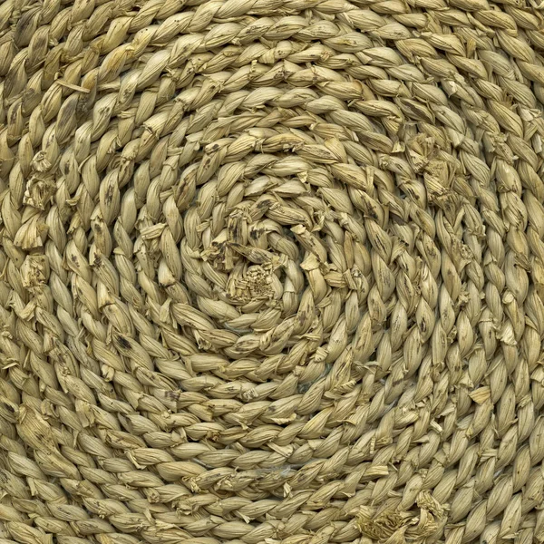 fragment of the bottom of a knitted basket as a background