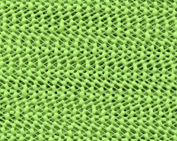 Zielony syntetyczny tekstura tworzywo jako tło — Zdjęcie stockowe